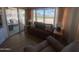 Comfortable living room with sliding door access to the patio area, filled with bright natural light at 2290 S Seminole Dr, Apache Junction, AZ 85119