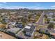 Aerial view of neighborhood shows the property with a black roof and a manicured backyard at 2402 N 15Th St, Phoenix, AZ 85006