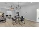 Open-concept dining area with modern decor, light wood floors, and plenty of natural light at 2402 N 15Th St, Phoenix, AZ 85006