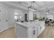 Open-concept kitchen with an island perfect for entertaining and stainless steel appliances at 2402 N 15Th St, Phoenix, AZ 85006