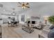 Spacious, open-concept living room with a modern kitchen and dining area at 2402 N 15Th St, Phoenix, AZ 85006