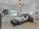 Serene main bedroom features a ceiling fan and stylish decor at 2402 N 15Th St, Phoenix, AZ 85006
