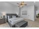 Serene main bedroom with neutral tones, ceiling fan, and stylish decor at 2402 N 15Th St, Phoenix, AZ 85006
