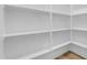 Bright walk-in closet with shelving, perfect for organizing clothes and accessories in a home at 2402 N 15Th St, Phoenix, AZ 85006