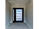 Modern entryway features a sleek front door design and ample natural light at 25927 N 149Th Dr, Surprise, AZ 85387