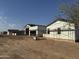 Exterior view of two new homes under construction in a residential neighborhood at 25927 N 149Th Dr, Surprise, AZ 85387