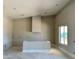Bright and airy kitchen space with a modern hood and plenty of room for appliances and customization at 25927 N 149Th Dr, Surprise, AZ 85387