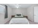 This comfy bedroom offers a full bed, two nightstands, and large window to the yard at 2615 N Hayden Rd # 114, Scottsdale, AZ 85257