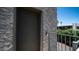 The exterior of the home features sturdy construction and a secure door at 2615 N Hayden Rd # 114, Scottsdale, AZ 85257