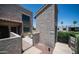 Exterior view highlighting the patio and surrounding community at 2615 N Hayden Rd # 114, Scottsdale, AZ 85257