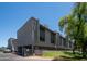 Complex exterior showing mature landscaping and secured entry at 2615 N Hayden Rd # 114, Scottsdale, AZ 85257