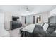 This main bedroom is complete with TV, dresser, and comfy bed for relaxed living at 2615 N Hayden Rd # 114, Scottsdale, AZ 85257