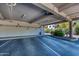 Underground parking garage with parking spaces and landscaping at 2615 N Hayden Rd # 114, Scottsdale, AZ 85257