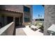 Charming patio with comfortable seating, perfect for outdoor relaxation at 2615 N Hayden Rd # 114, Scottsdale, AZ 85257