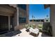 Comfortable outdoor patio area with seating, ideal for enjoying the weather at 2615 N Hayden Rd # 114, Scottsdale, AZ 85257