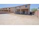 Large backyard featuring a covered patio and ample space for customization and relaxation at 30268 W Sheila Ln, Buckeye, AZ 85396