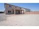 Spacious backyard with potential for outdoor activities, featuring a covered patio at 30268 W Sheila Ln, Buckeye, AZ 85396