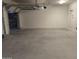 Spacious two car garage with an automatic door and utility access at 30268 W Sheila Ln, Buckeye, AZ 85396