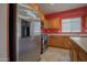 Modern kitchen featuring stainless steel appliances and a center island at 30268 W Sheila Ln, Buckeye, AZ 85396