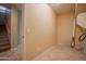 Functional laundry area with tile flooring and potential for additional storage at 30268 W Sheila Ln, Buckeye, AZ 85396