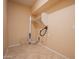 Practical laundry room featuring essential hookups and neutral-toned walls at 30268 W Sheila Ln, Buckeye, AZ 85396