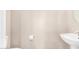 Powder room with a pedestal sink and a toilet at 3228 W Saint Anne Ave, Phoenix, AZ 85041