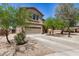 Well-kept two-story home with a two-car garage and low-maintenance desert landscaping for easy upkeep at 3228 W Saint Anne Ave, Phoenix, AZ 85041