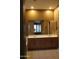 Bathroom featuring a double vanity and a large mirror at 34464 N 68Th Way, Scottsdale, AZ 85266