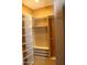 Walk-in closet with a variety of shelving and hanging options for organization at 34464 N 68Th Way, Scottsdale, AZ 85266