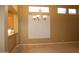 Bright dining area featuring a window with shutters and chandelier lighting at 34464 N 68Th Way, Scottsdale, AZ 85266