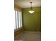 Bright dining area featuring a window with shutters and chandelier lighting at 34464 N 68Th Way, Scottsdale, AZ 85266