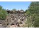 Desert home and landscape in natural setting at 34464 N 68Th Way, Scottsdale, AZ 85266