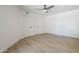 Bedroom with a modern ceiling fan and spacious closets at 3701 W Villa Maria Dr, Glendale, AZ 85308