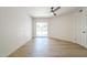 Bright, airy bedroom features ceiling fan, backyard access and plank floors at 3701 W Villa Maria Dr, Glendale, AZ 85308