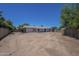 Spacious lot with a view of the back exterior and the back patio at 3701 W Villa Maria Dr, Glendale, AZ 85308
