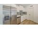 Updated kitchen with stainless steel appliances, modern cabinetry, and stylish backsplash at 3701 W Villa Maria Dr, Glendale, AZ 85308