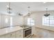 Open concept living and kitchen area, with lots of light, modern appliances and stylish finishes at 3701 W Villa Maria Dr, Glendale, AZ 85308