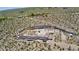 Aerial view of a property under construction in a desert landscape at 39307 N Silver Saddle Dr, Carefree, AZ 85377