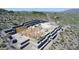 New construction of a home, situated on a hillside with layered terracing at 39307 N Silver Saddle Dr, Carefree, AZ 85377