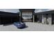 Modern home exterior with a blue convertible parked in the driveway at 39307 N Silver Saddle Dr, Carefree, AZ 85377