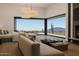 Airy main bedroom with desert views, hardwood floors, and stylish furniture at 39307 N Silver Saddle Dr, Carefree, AZ 85377