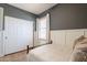 Comfortable bedroom with modern closet, window and earth tone color scheme at 4235 S Snowcap Dr, Gilbert, AZ 85297