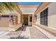 Inviting front entrance with stone accents, leading to the main door and showcasing the home's curb appeal at 4235 S Snowcap Dr, Gilbert, AZ 85297