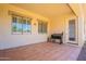 Covered patio features tile floor, light color and grill at 4235 S Snowcap Dr, Gilbert, AZ 85297