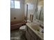 Bathroom featuring vintage pink tub and fixtures in need of complete renovation at 4304 N 55Th Dr, Phoenix, AZ 85031
