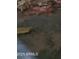Close-up of a severely damaged and collapsing ceiling with exposed insulation at 4304 N 55Th Dr, Phoenix, AZ 85031