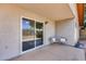 Covered back patio with seating and a view of the spacious backyard at 4344 W Kimberly Way, Glendale, AZ 85308