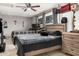 Bedroom features wood floors, neutral paint, and ceiling fan at 4403 N 48Th Dr, Phoenix, AZ 85031