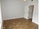 This bedroom features tile floors, neutral paint, and a ceiling fan at 4465 E Paradise Village S Pkwy # 1200, Phoenix, AZ 85032
