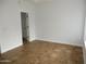 Neutral bedroom with tile floors and white trim offers a flexible space at 4465 E Paradise Village S Pkwy # 1200, Phoenix, AZ 85032